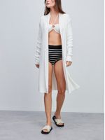 29581 casaco _ 46467 top_ 12332 hotpant_ANSELMI 2023 VERAO- DIA01 - JORGE_MARI_JADE7349
