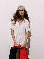 Blusa longa feminina de tricô plissado com gola polo, da Anselmi