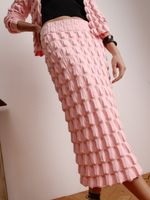 Saia midi feminina de tricô com relevo em ponto Origami, da Anselmi