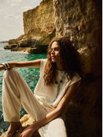 Calça pantalona feminina de tricô em ponto Links com cós elástico, da Anselmi